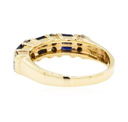 0.60 ctw Sapphire and Diamond Ring - 14KT Yellow Gold