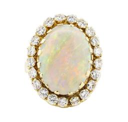 7.90 ctw Opal And Diamond Ring - 14KT Yellow Gold