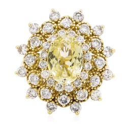 6.09 ctw Oval Mixed Yellow Sapphire And Round Brilliant Cut Diamond Ring - 14KT