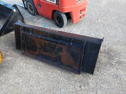 Skid loader bucket