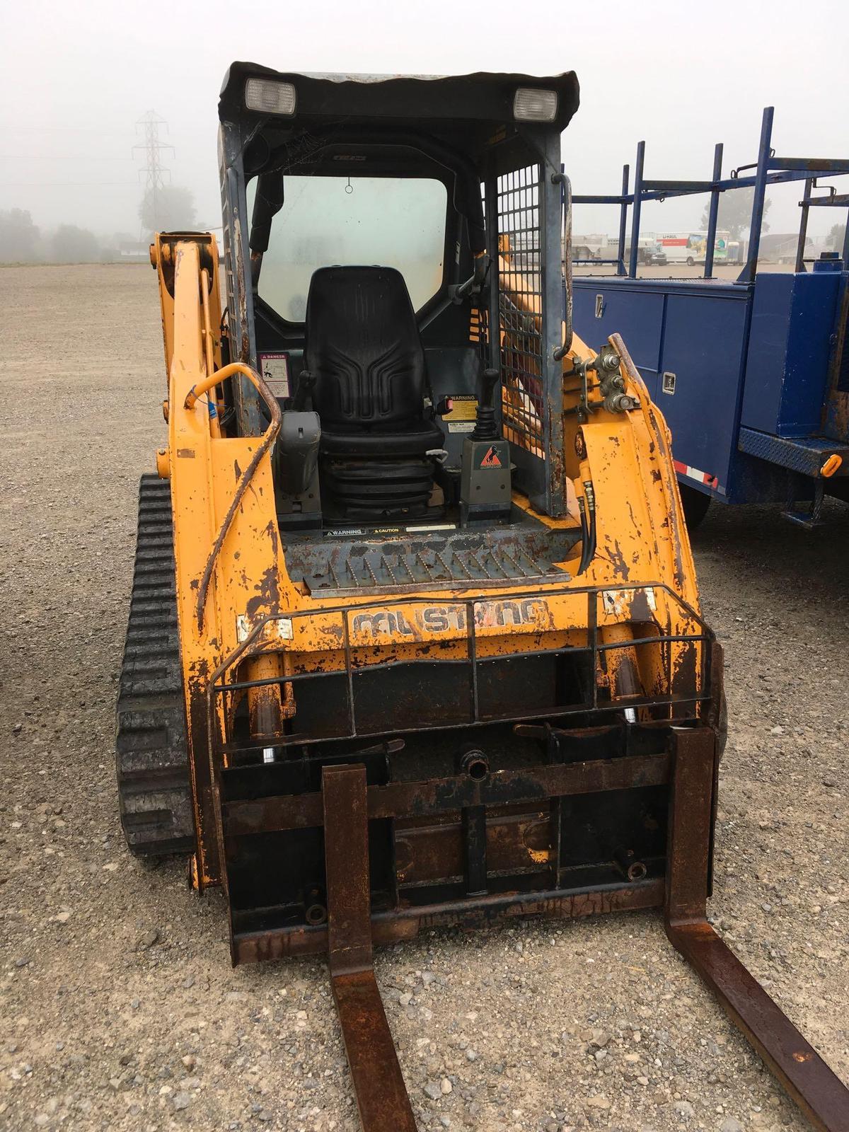 Mustang MTL 20 skid steer track loader with forks.