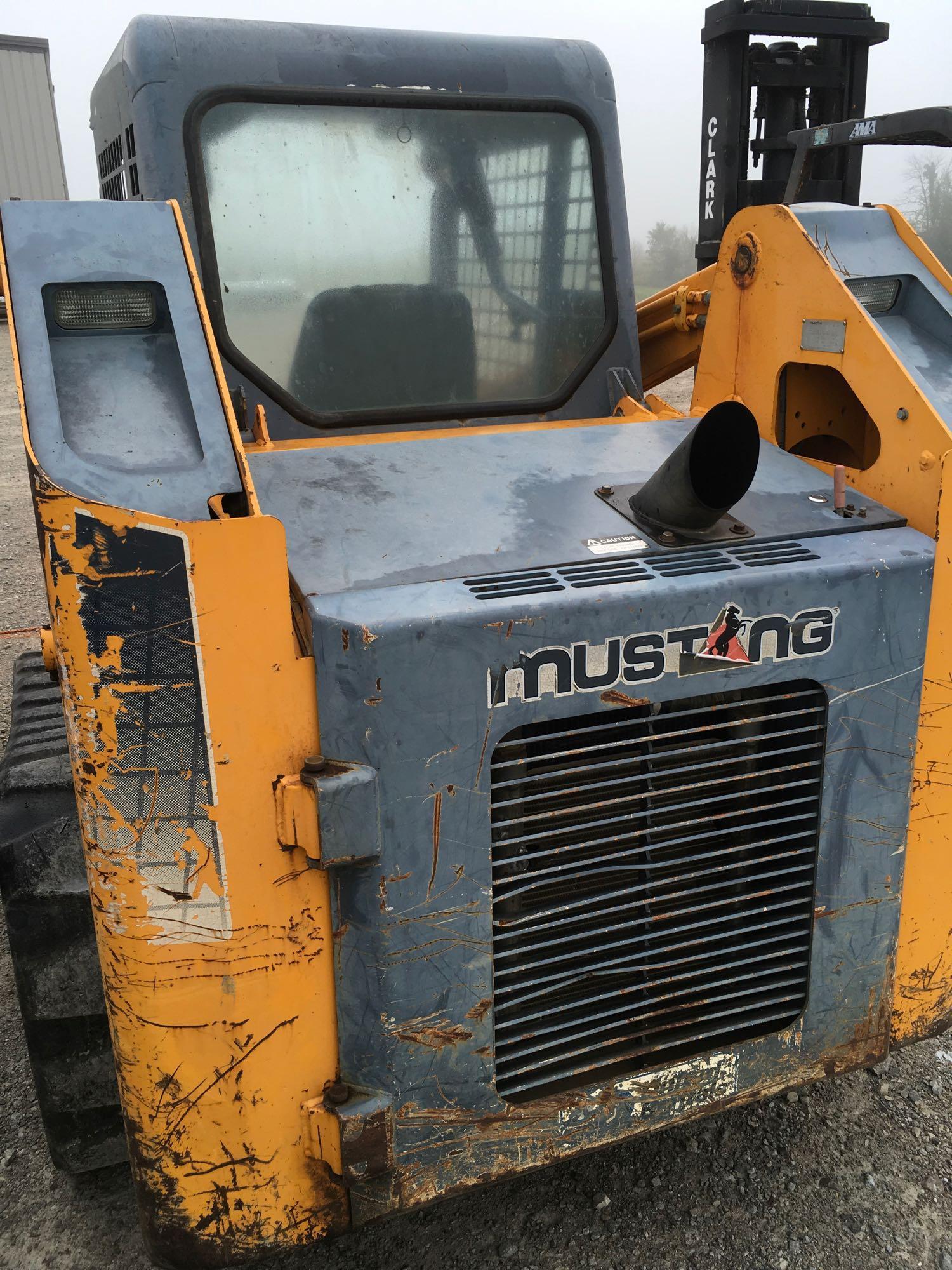 Mustang MTL 20 skid steer track loader with forks.