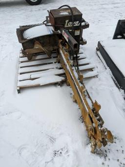 1132- Lowe trencher skid loader attachment