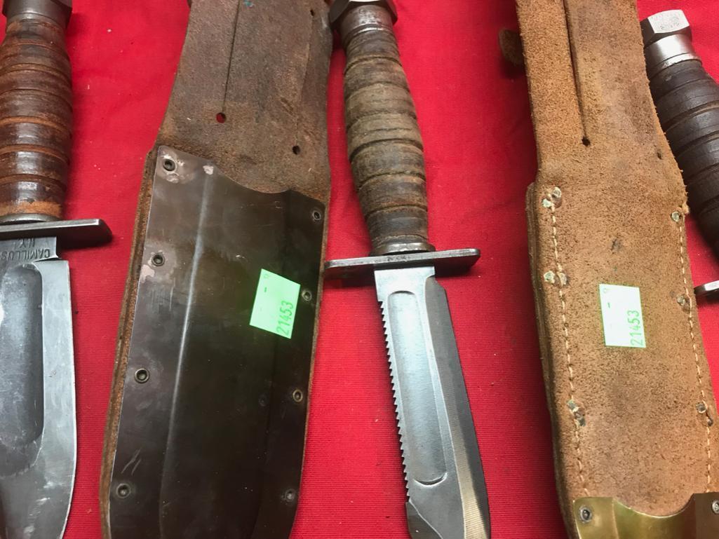 Lot of 3 Vintage Knives with sharpening stones in sheaths. One is Ontario, other 2 are like brand