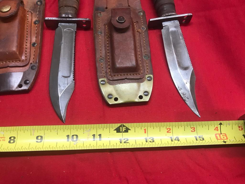 Lot of 3 Vintage Knives with sharpening stones in sheaths. One is Ontario, other 2 are like brand