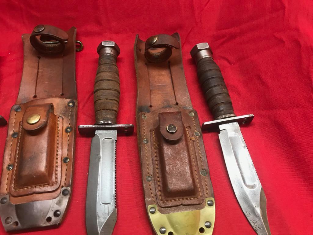 Lot of 3 Vintage Knives with sharpening stones in sheaths. One is Ontario, other 2 are like brand