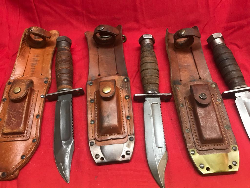 Lot of 3 Vintage Knives with sharpening stones in sheaths. One is Ontario, other 2 are like brand