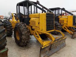 27024- John Deere JD540-B Skidder, showing 9695 hours