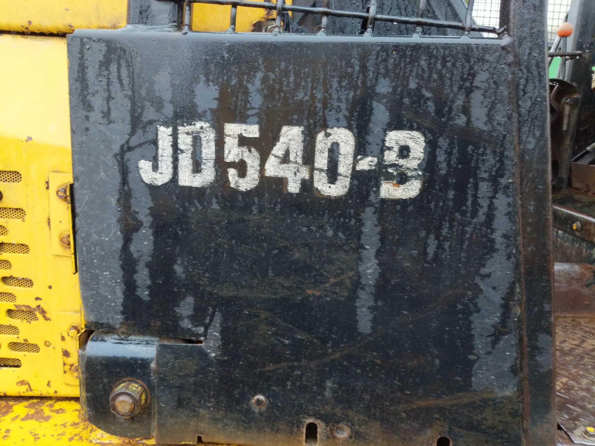 27024- John Deere JD540-B Skidder, showing 9695 hours