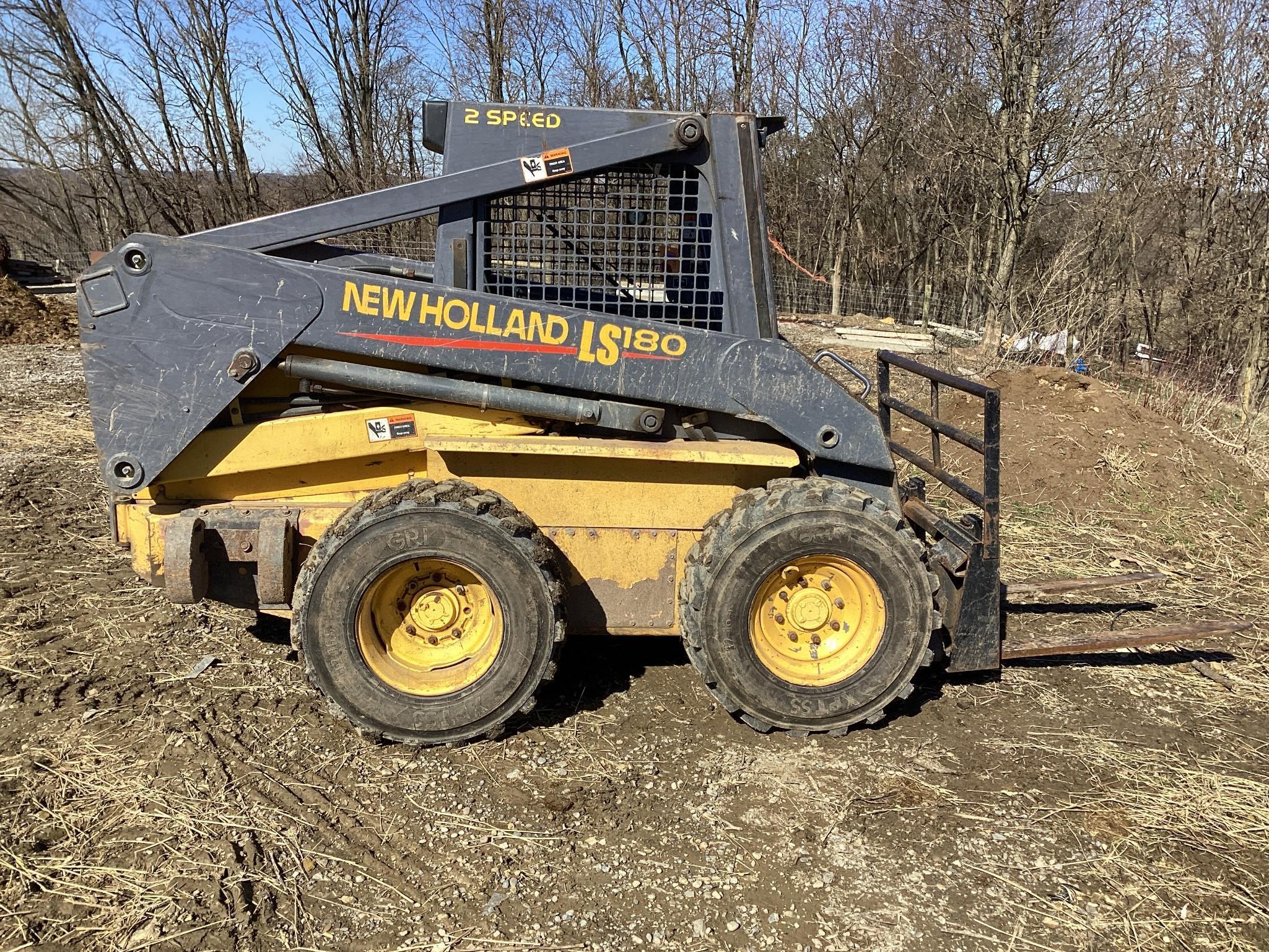 New Holland LS180 Skid Loader with Bucket and Forks, 3551 Hours