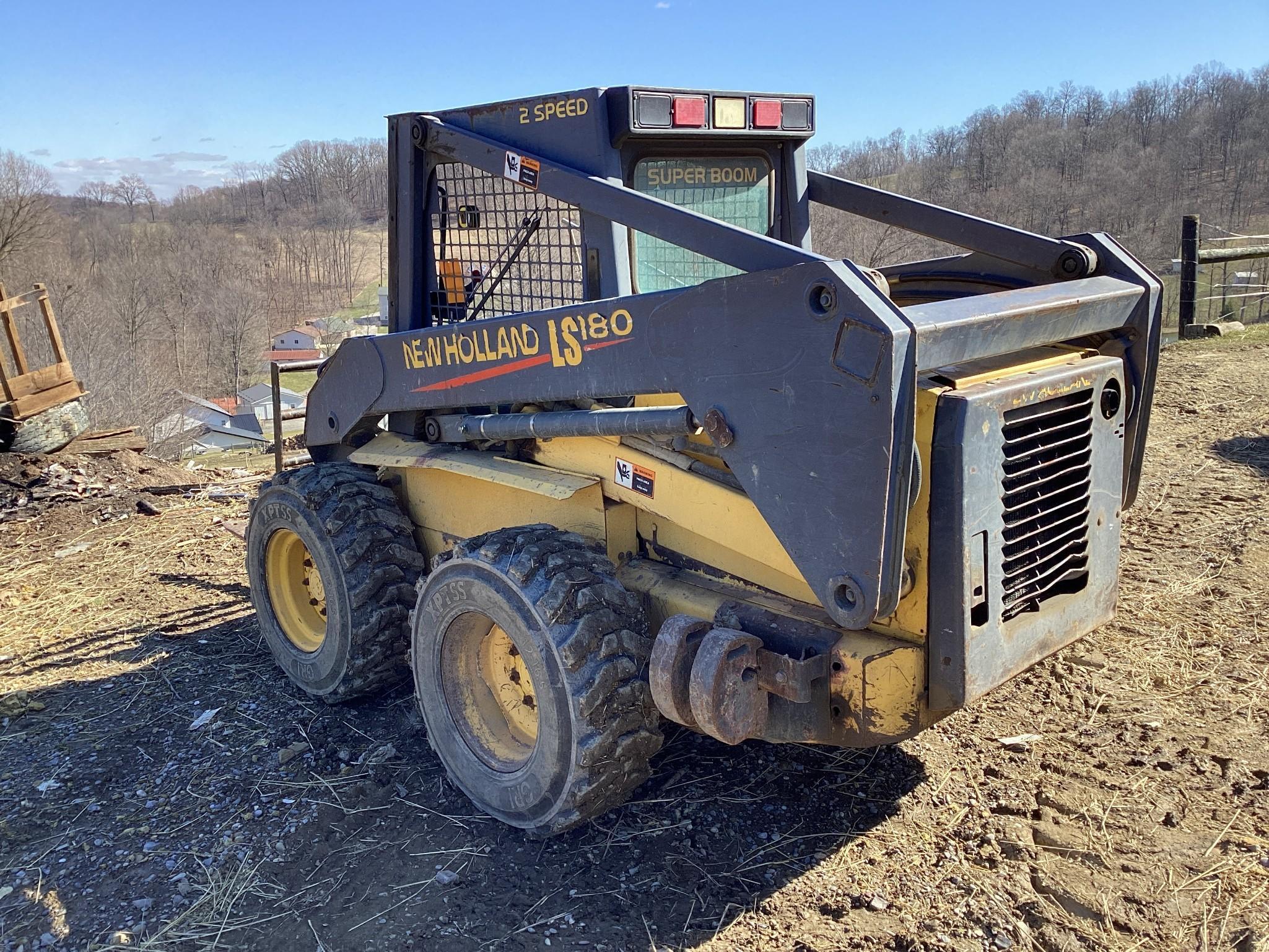 New Holland LS180 Skid Loader with Bucket and Forks, 3551 Hours