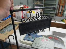 wrought iron welcome sign