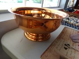 Copper color bowl , and  "celebrate it" dish