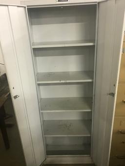 Metal storage cabinet made by Interstate Industries (lot 10)