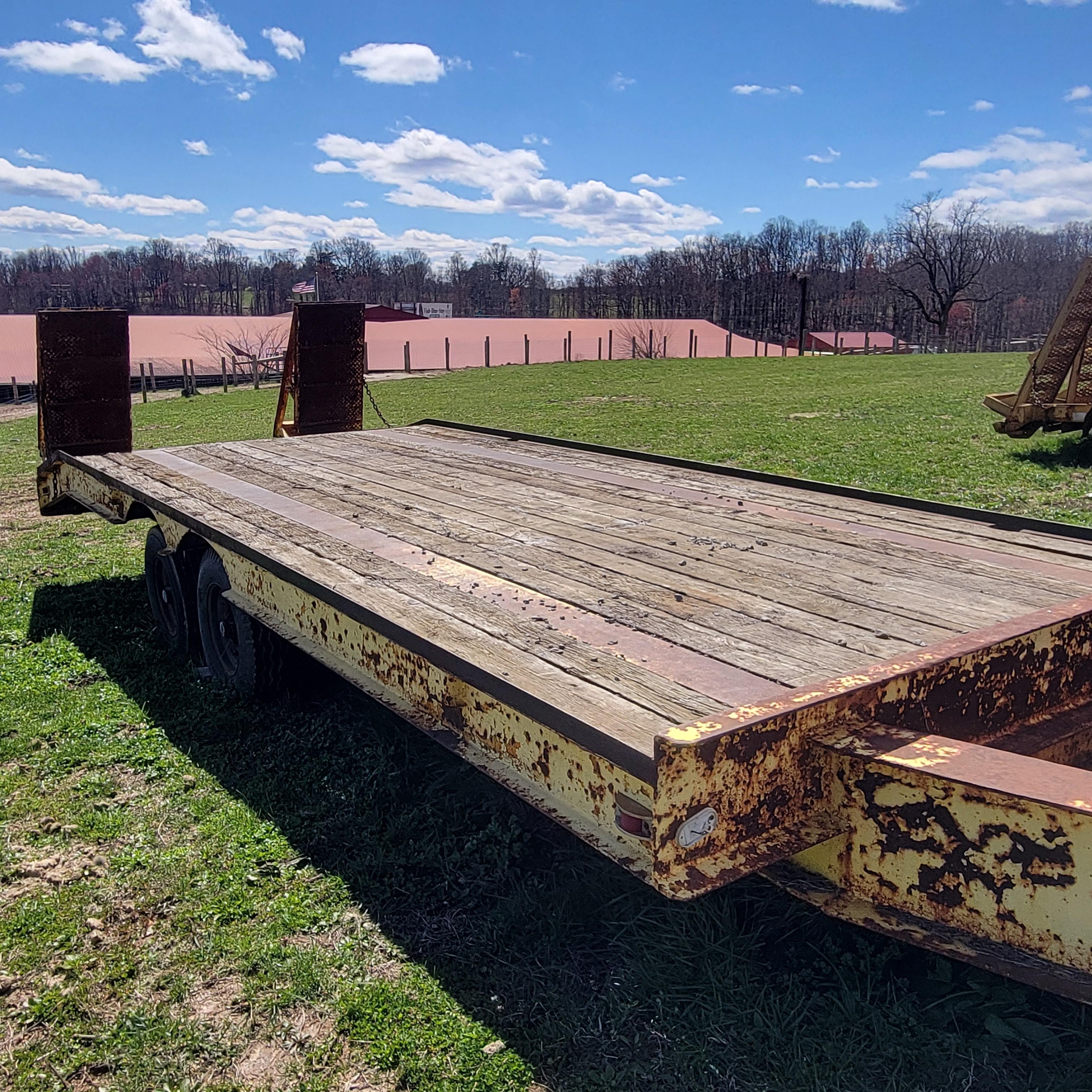 DUAL AXLE FLAT DECK TRAILER - YELLOW W/ PINTLE HITCH AND RAMPS