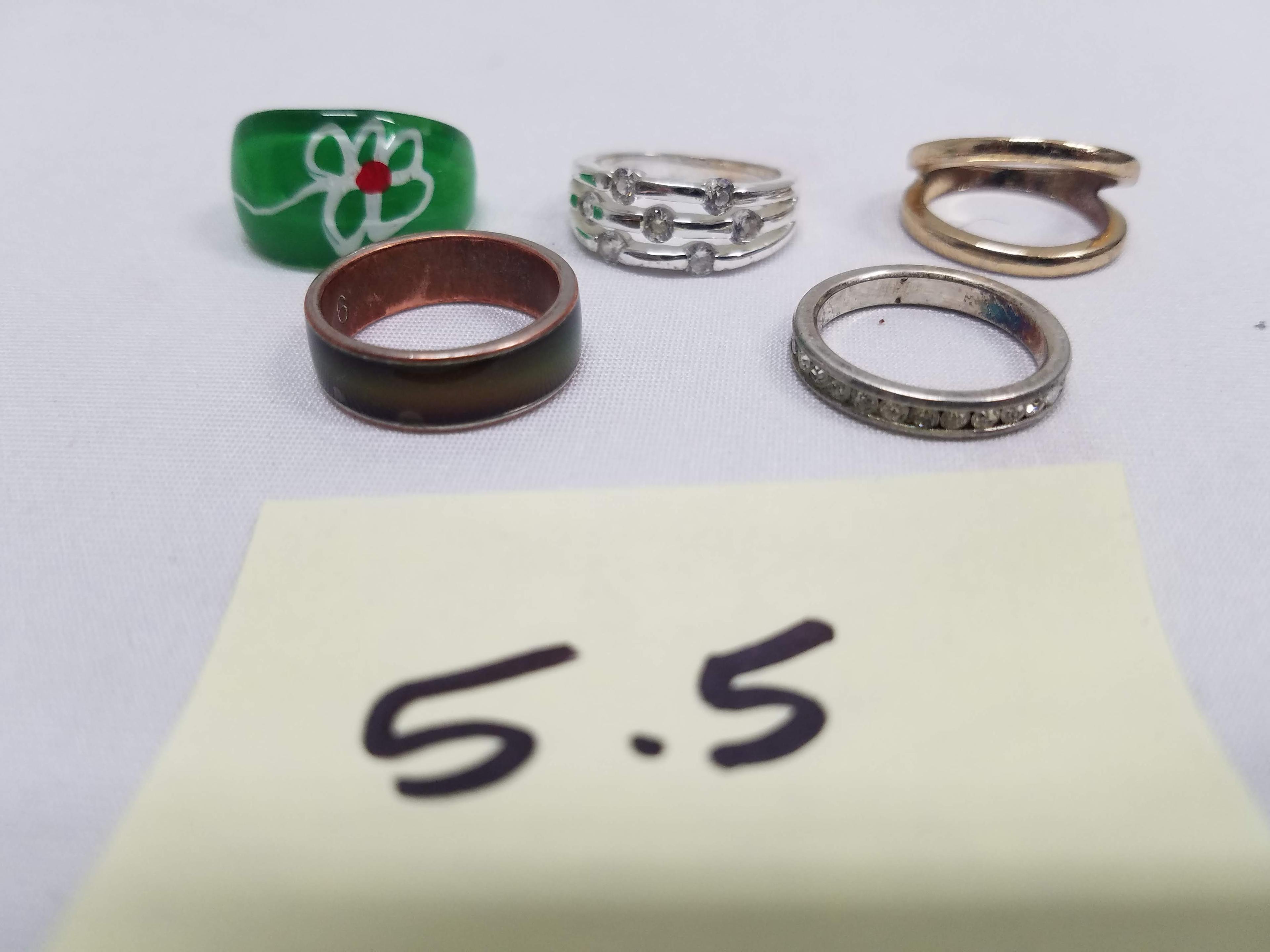5 Rings size 5.5: 1 Green, 1 "Gold" & 3 "Silver"