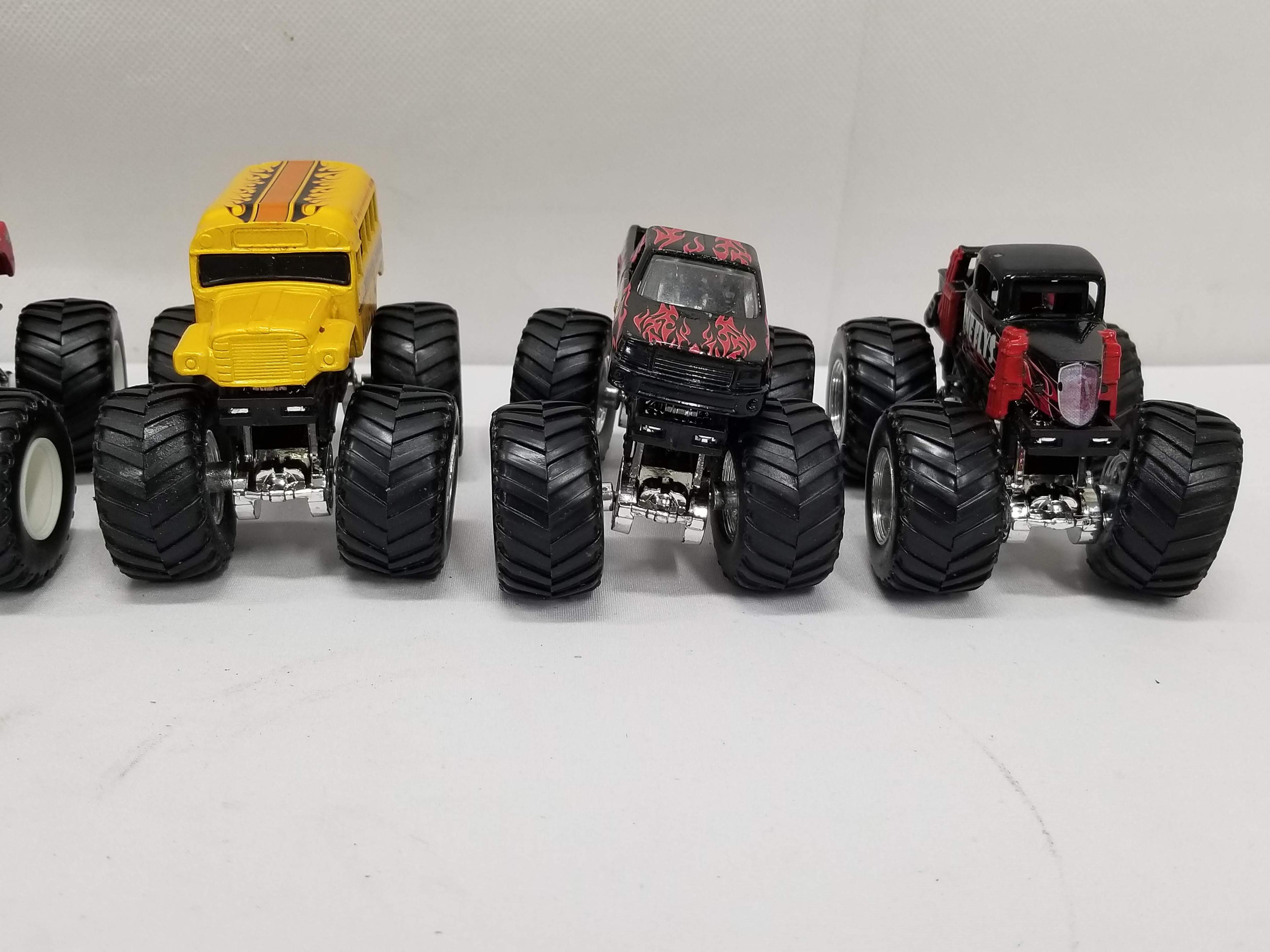 6 Smaller Monster Truck Toys: Driving Skool, Time Flys, etc.