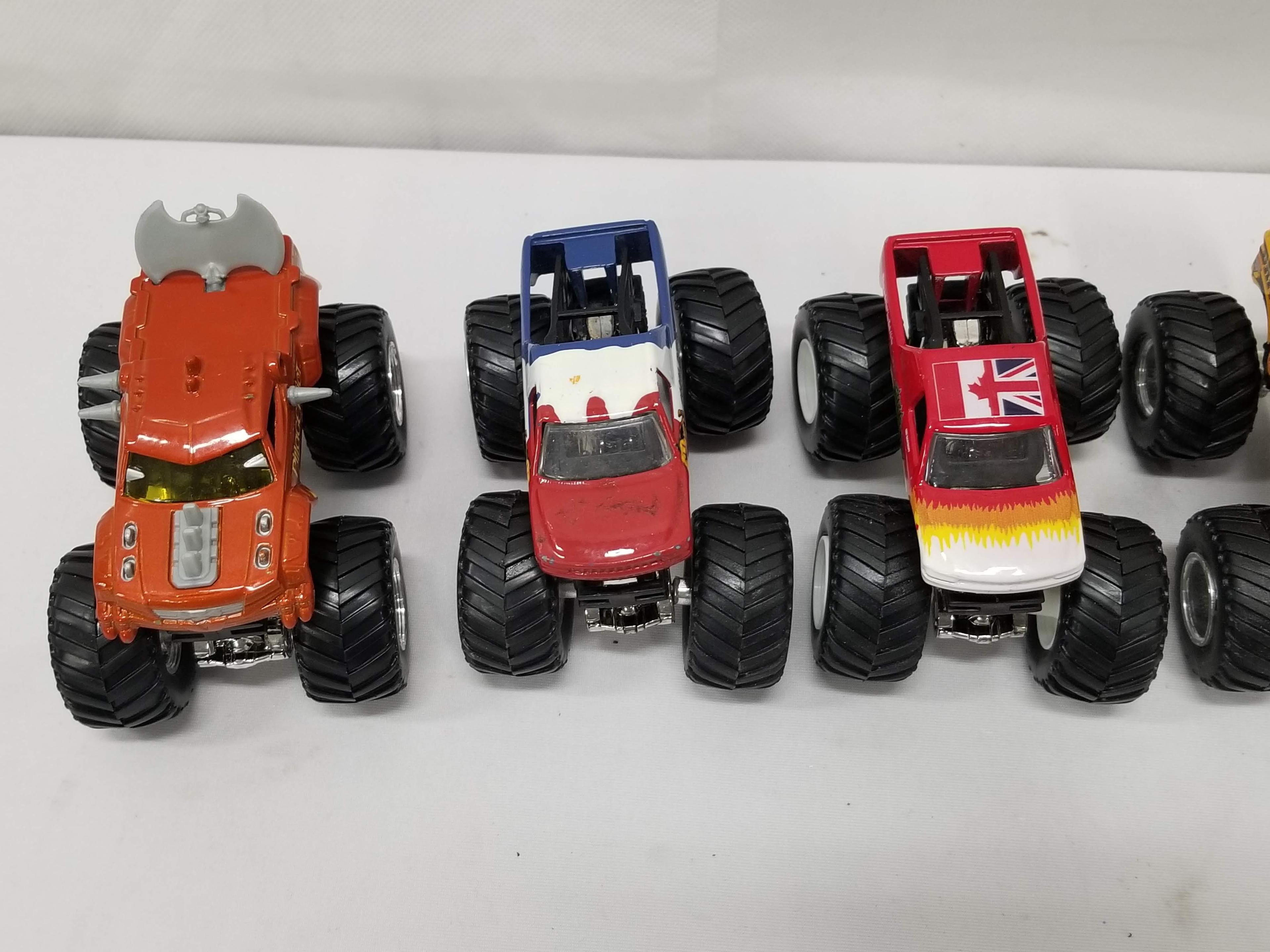 6 Smaller Monster Truck Toys: Driving Skool, Time Flys, etc.