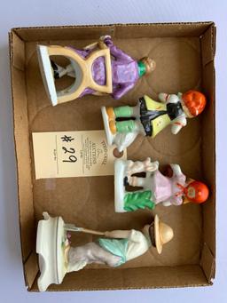 FOUR COLLECTIBLE FIGURINES