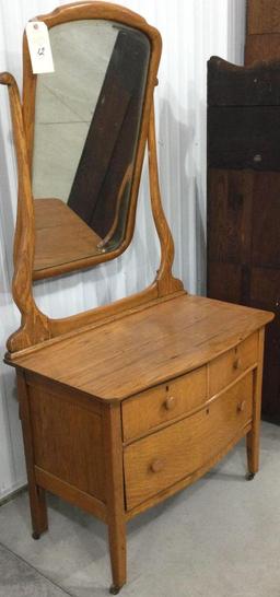 Antique oak ladies dresser on casters