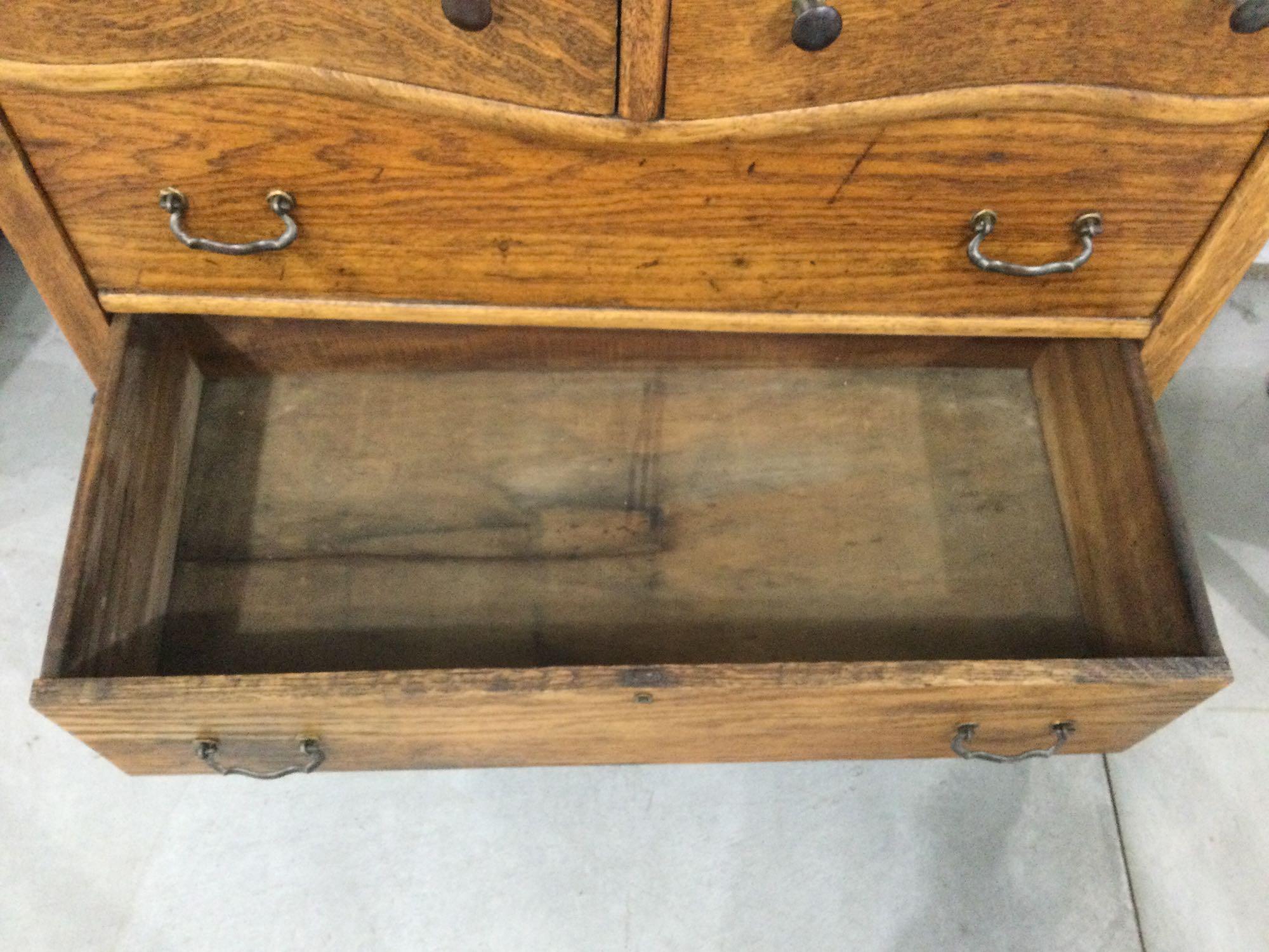 Antique curved drawer dresser