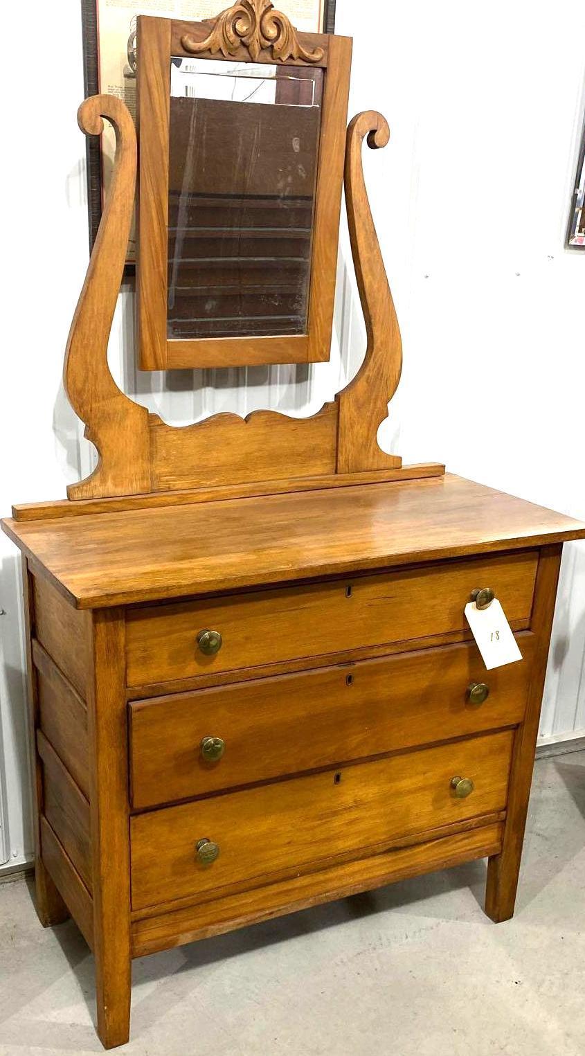 Antique three drawer dresser with mirror