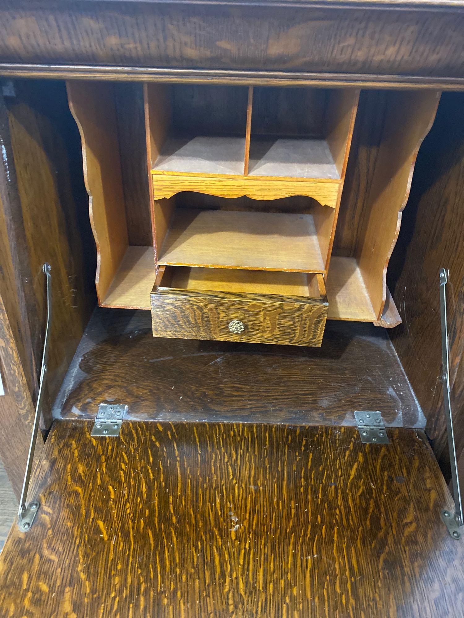 Antique drop front secretary with side curio on casters