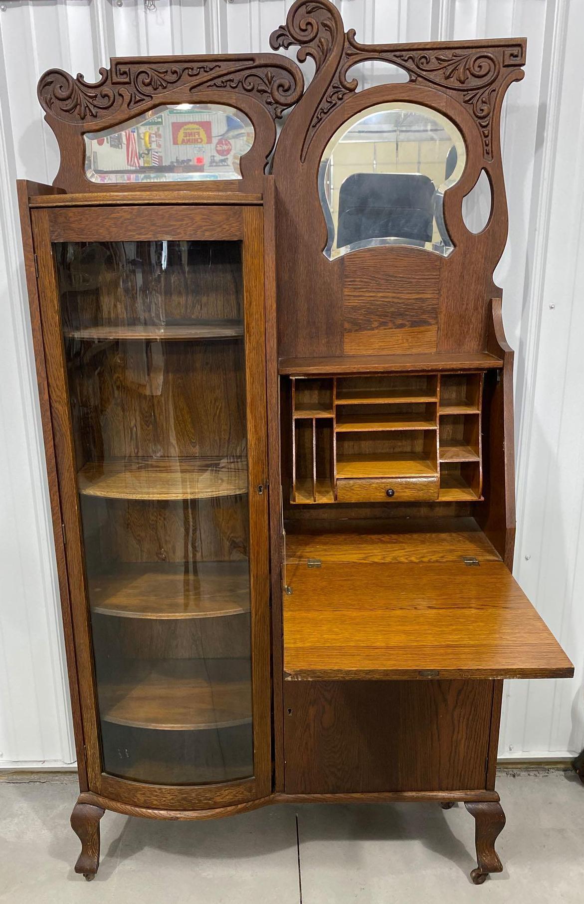 Antique drop front secretary on casters with side curio