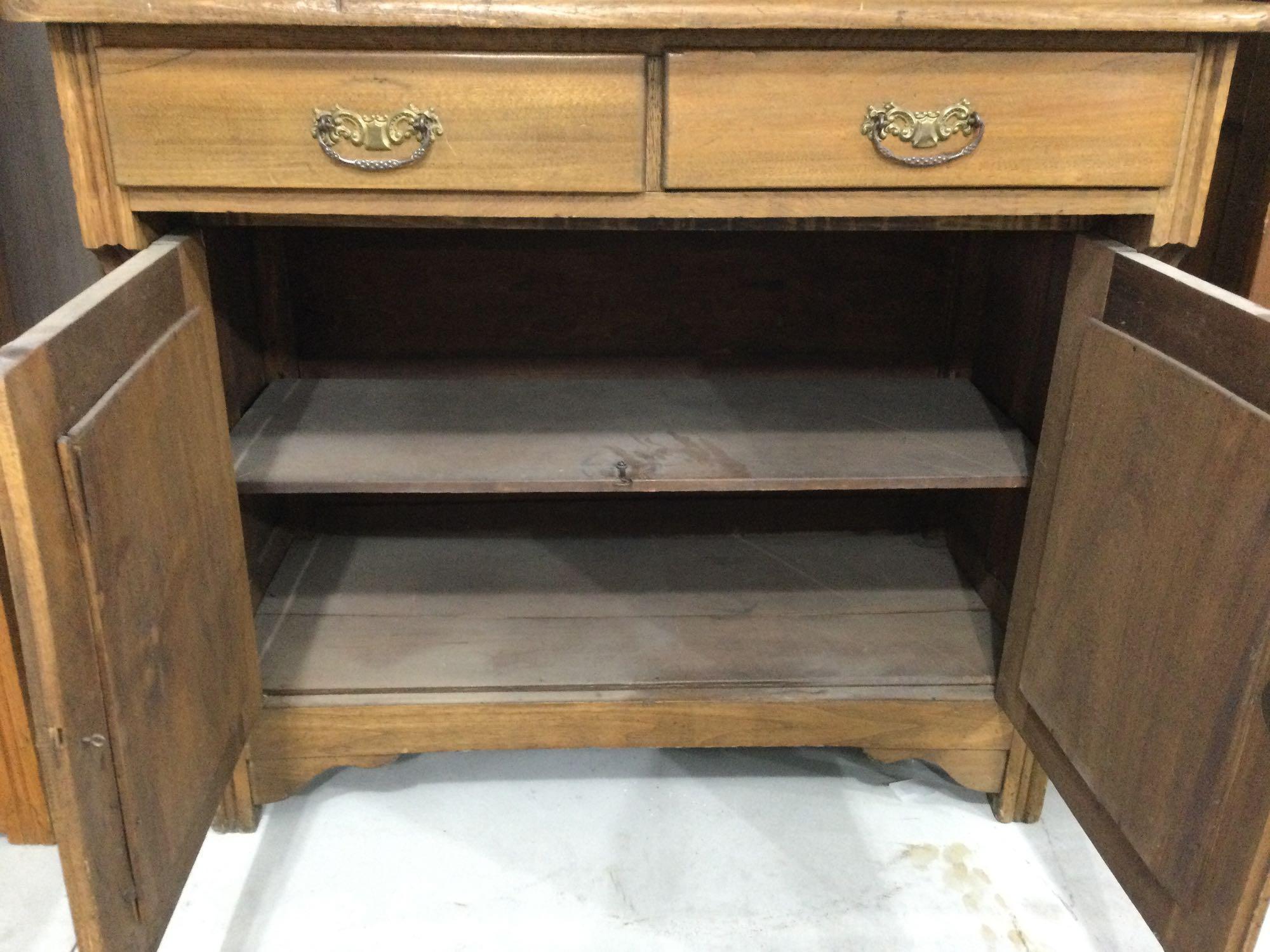 Antique walnut step back cupboard