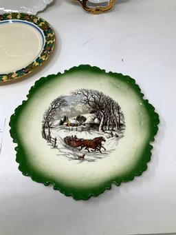 Four vintage decorated plates