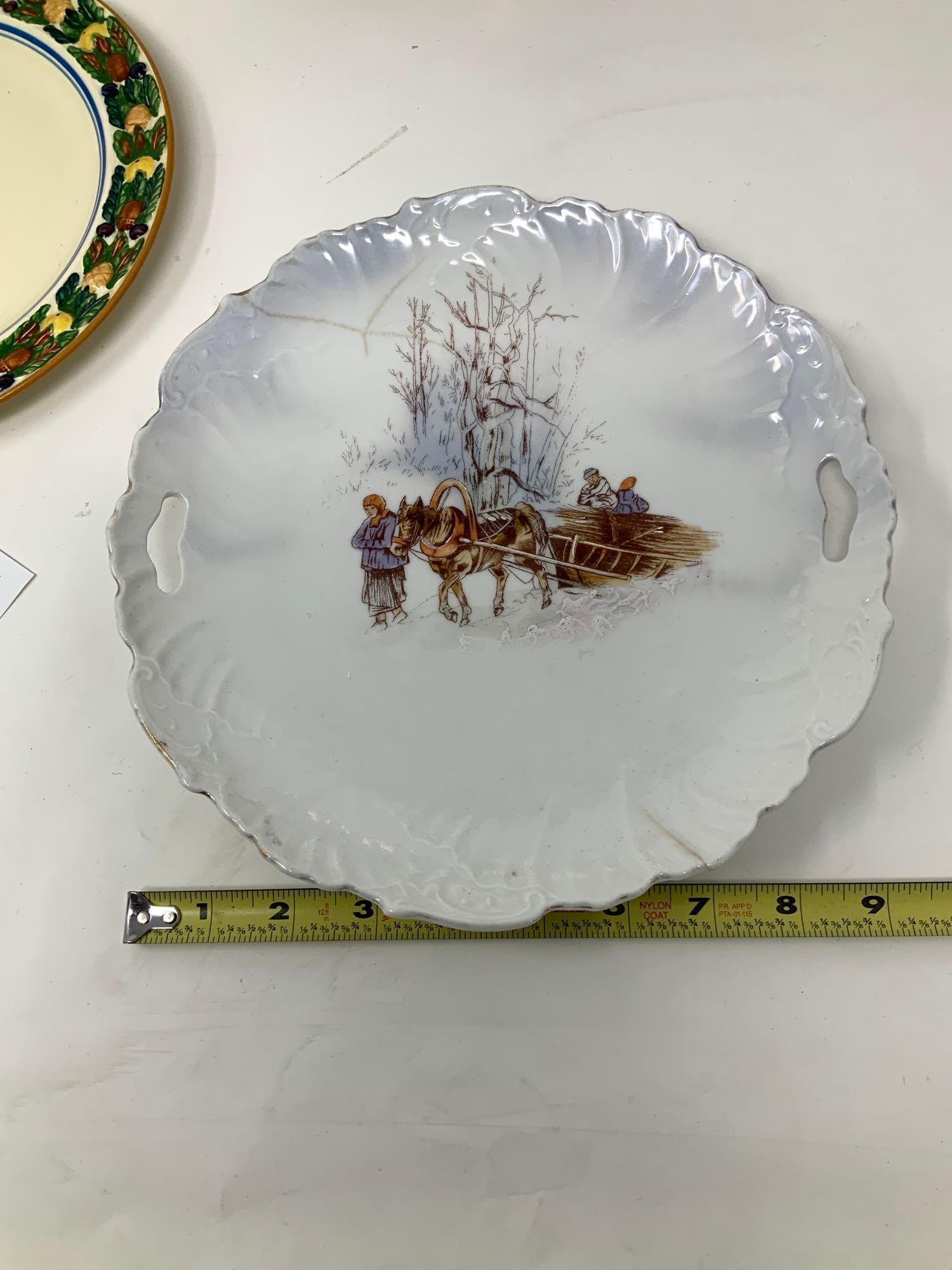 Four vintage decorated plates