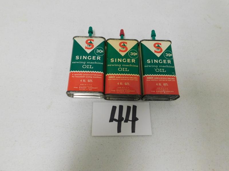 SINGER OIL CANS