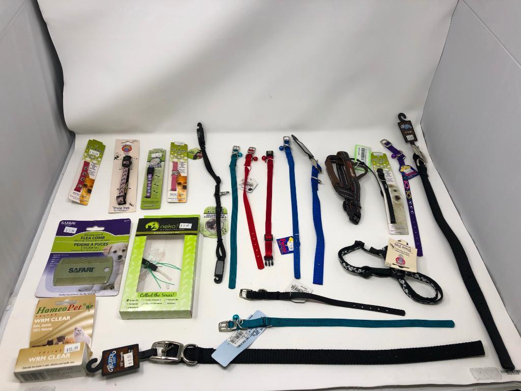 21, assorted leashes, collars, and harnesses, flea and worm control, toy