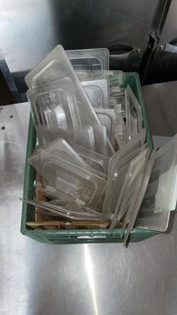 Crate of plastic lids