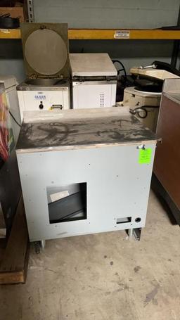 Metal cabinet with stainless top