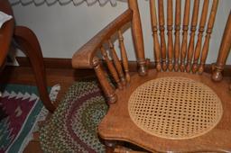 Antique rocking chair with cane bottom