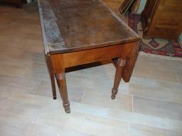 Antique drop leaf wooden table