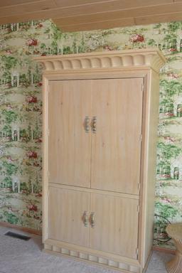 Upright Wardrobe/entertainment center with Pull out drawers