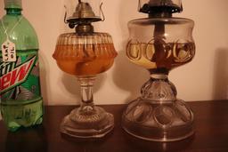 Two Clear Glass Oil Lamps