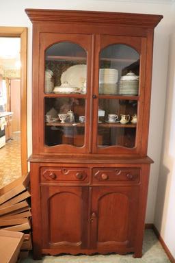 Antique walnut breakfront cabinet