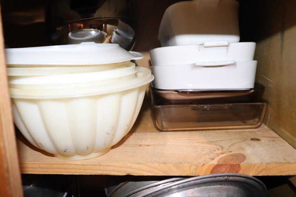 Contents of cabinets including pie pans, casserole dishes, Pyrex, etc.