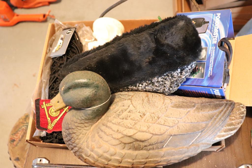 Flat of misc including outdoor small waterpump, belt buckles, duck, sun dial