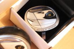 Various years of Cadillac wheel medallions