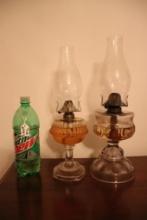 Two Clear Glass Oil Lamps