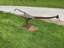 Early horse drawn potato plow