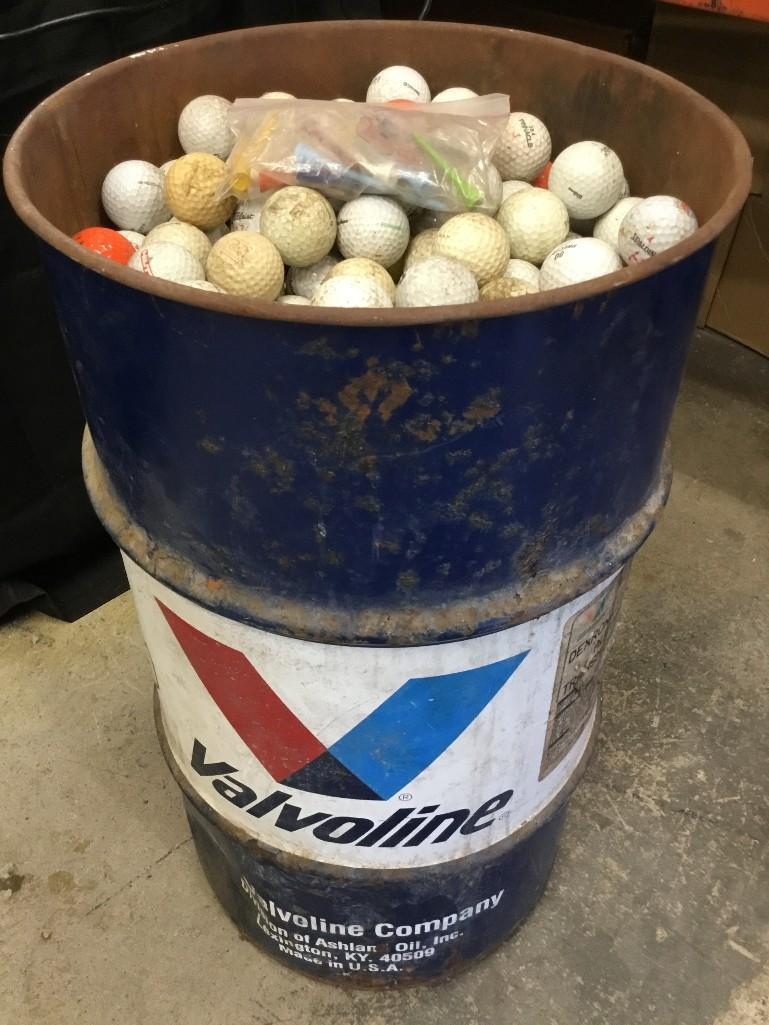 16 gallon Valvoline drum filled with used golf balls