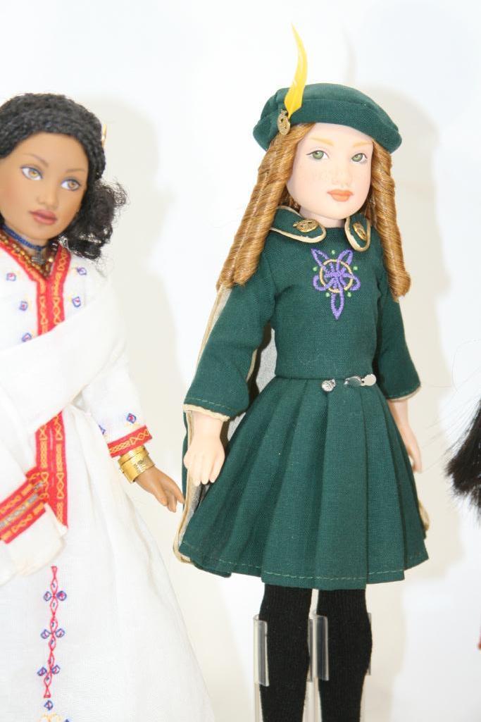 The Girls Of Many Lands Doll Collections 9 inch Dolls with Stands and Information Brochure.