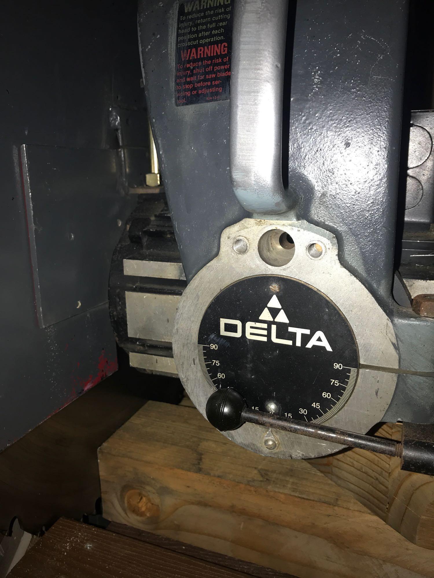 Delta 5 HP, 3 phase with a 20? blade Blade Radial Arm Saw Mounted Work Table Powers on and Runs