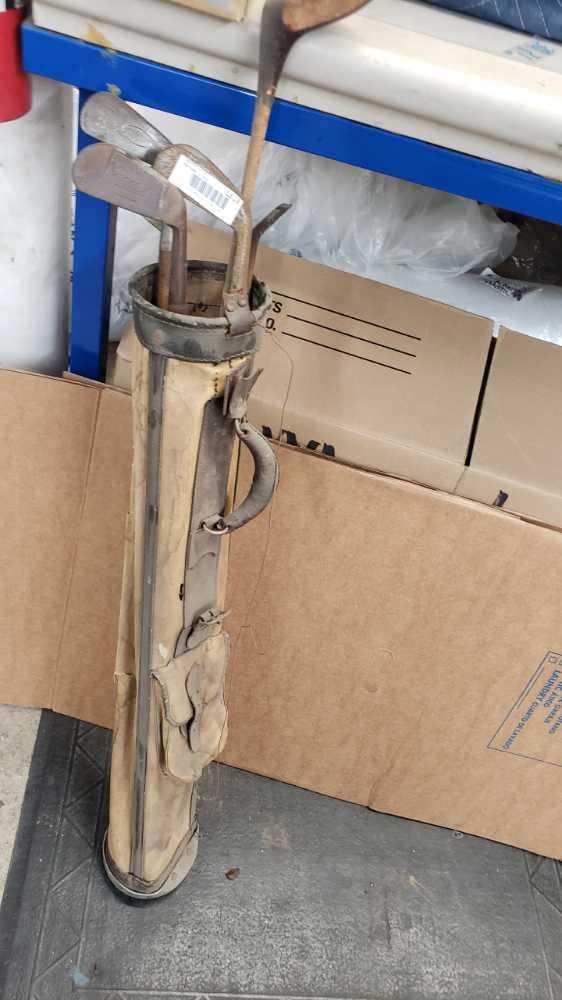 old golf clubs surface rust torn bag Location:... Front Shop