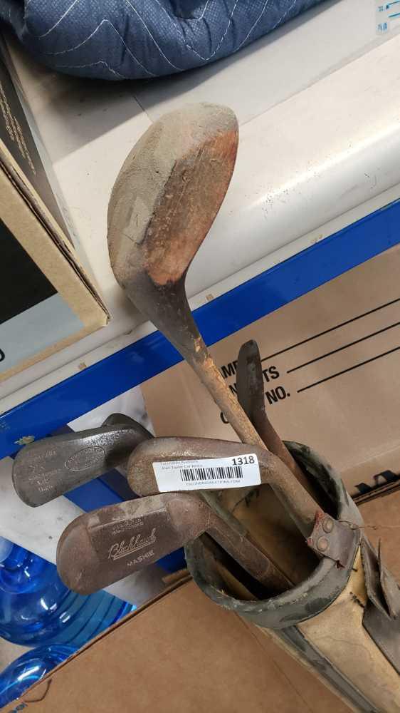 old golf clubs surface rust torn bag Location:... Front Shop